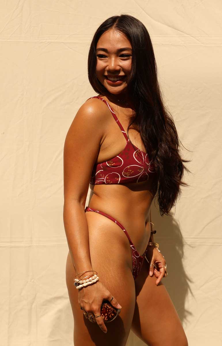 tai swim alana top and alana bottom in cowry red maroon shell pattern bikini on ribbed swim material