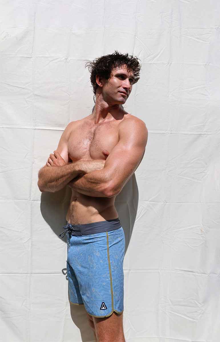 tai swim co ahi fish hand drawn design boardshorts from sustainable local brand tai swim hawaii kailua hawaiian owned brand short inseam luxury boardshorts from windward side oahu model in swim trunks