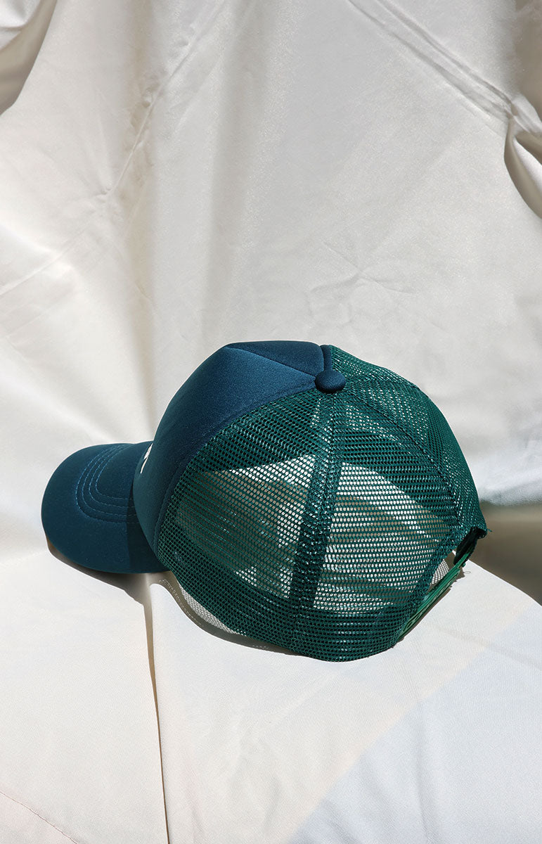 tai swim co embroidered trucker foam hat from kailua oahu made from recycled materials with hand woven embroidery local beach girl hat from hawai'i in kailua shop keiko collaboration with adjustable strap and back mesh