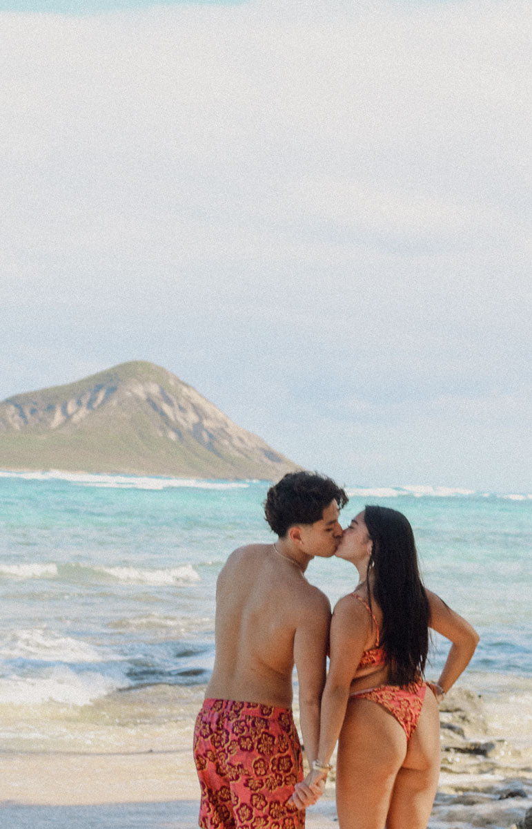 tai swim co ewa braden 7in inseam boardshorts in ewa red floral hibiscus print swimwear bottoms and matching bikini prints sustainable ethically made red fourth of july swimwear bottoms for guys hawaii kailua oahu local swimwear bikinis and shorts