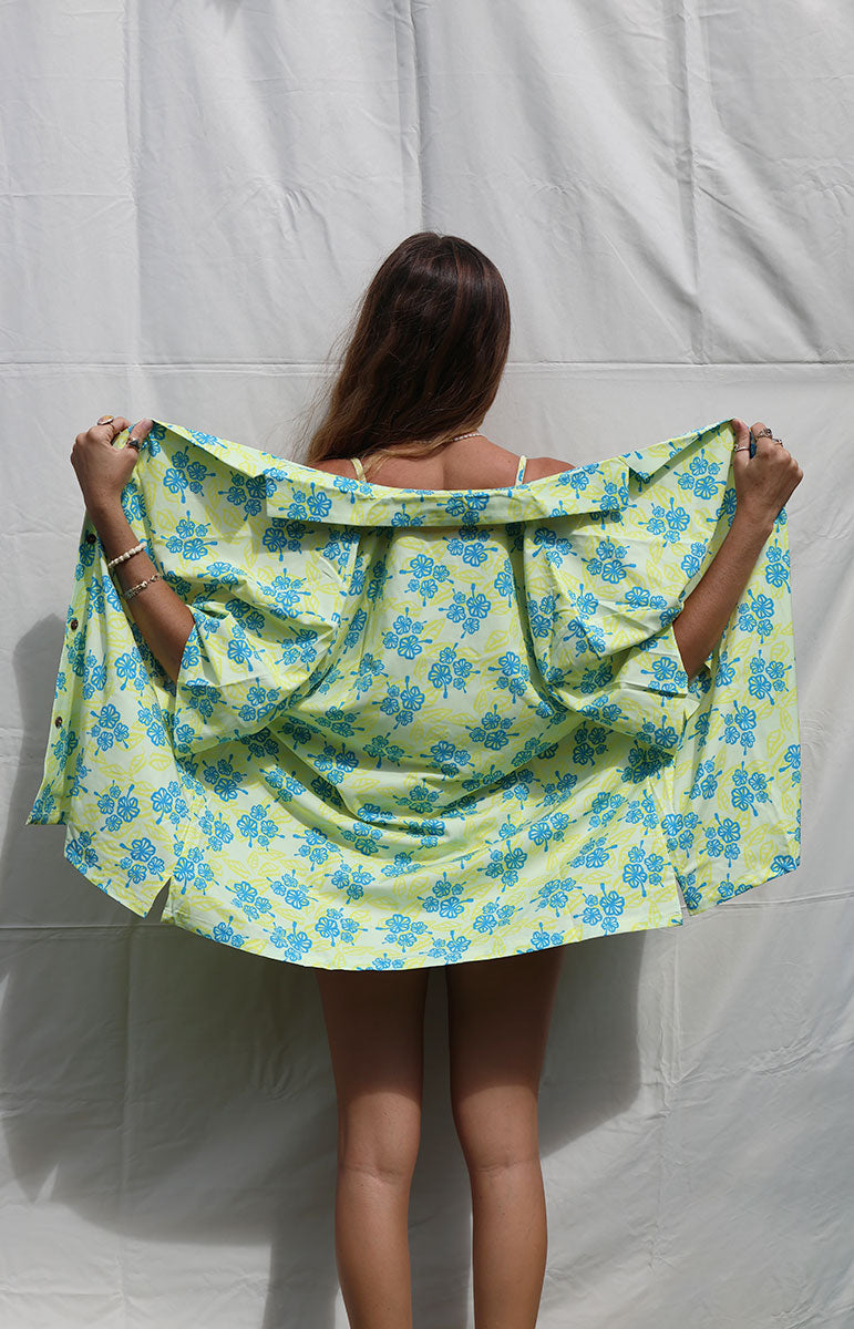 tai swim co braden shirt in avalon channel islands bikinis swimwear stores on catalina island blue hibiscus floral yellow swimwear tops and bottoms from hawaii sustainable skimpy swimsuits in nostalgic blue and yellow hawaii surf prints