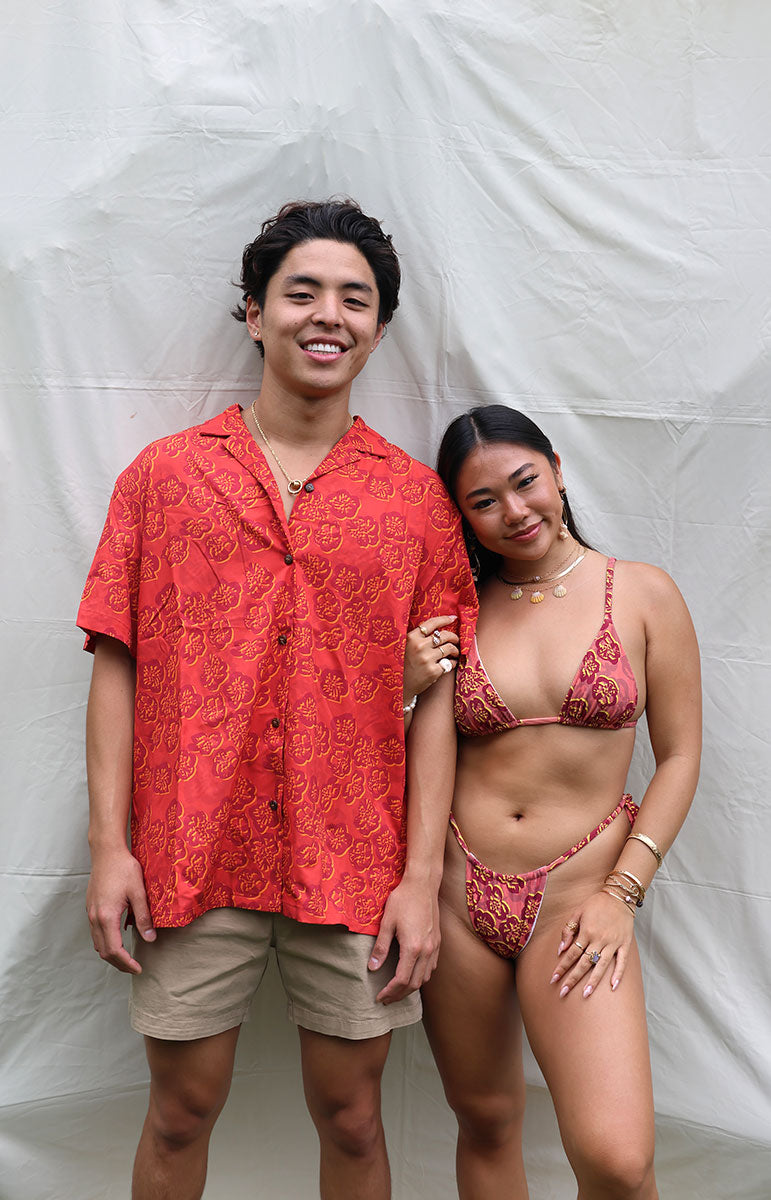 tai swim co braden shirt in ewa red floral hawaiian designed woodblock print red ilima matching sustainable red shirt from oahu kailua hawaiian designed clothing made in hawaii local swimwear brands with matching bikini and matching red shorts