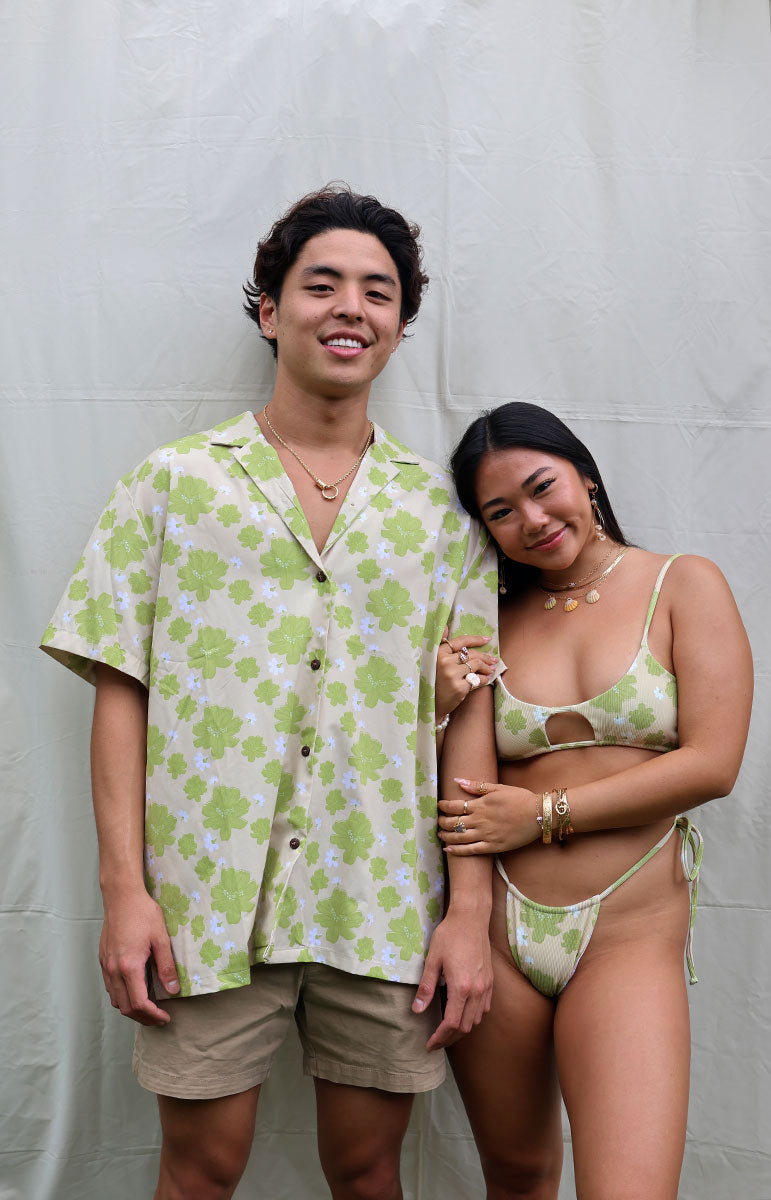 tai swim co braden shirt in kahakai naupaka kahakai green hawaiian floral hand drawn print on a linen breathable shirt with wood buttons and comfy easily washable comfy shirt made in hawaii locally kailua oahu kailua bikinis and matching shirts guys and girls matching swimwear styles