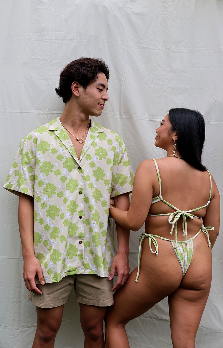 tai swim co braden shirt in kahakai naupaka kahakai green hawaiian floral hand drawn print on a linen breathable shirt with wood buttons and comfy easily washable comfy shirt made in hawaii locally kailua oahu kailua bikinis and matching shirts button down eco rayon shirt