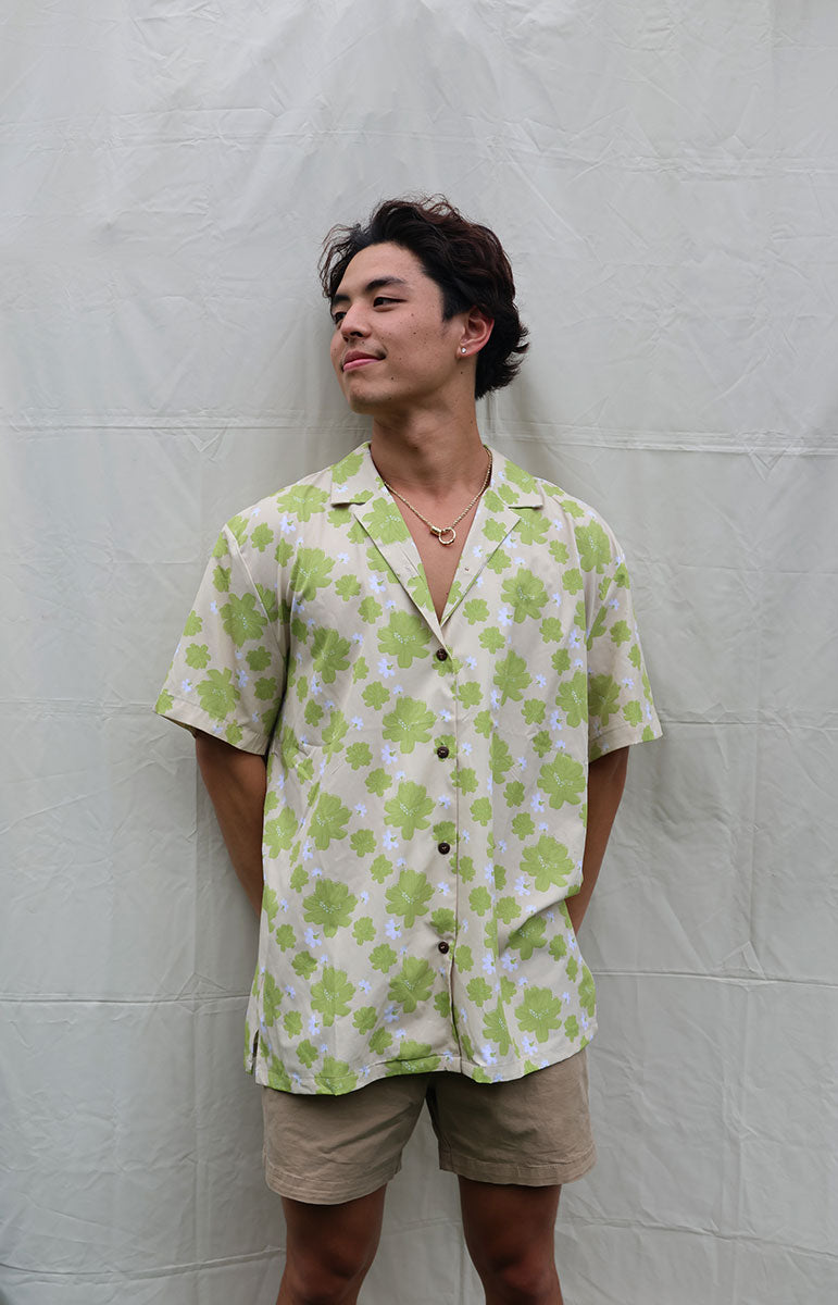 tai swim co braden shirt in kahakai naupaka kahakai green hawaiian floral hand drawn print on a linen breathable shirt with wood buttons and comfy easily washable comfy shirt made in hawaii locally kailua oahu kailua bikinis and matching shirts