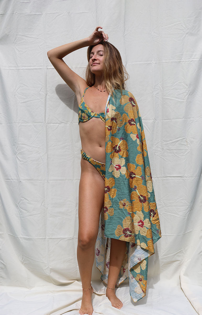 tai swim co coco sarong in milo flower from native hawaiian plant tree inspired by hawaii tai swim co hawaiian floral beach sarong cover up from kailua windward side oahu local bikinis made from sustainable materials