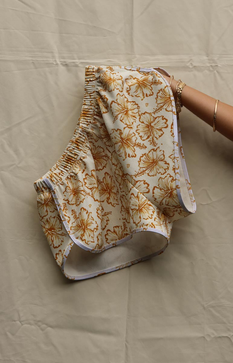 tai swim co gio top and shorts in waimea yellow hibiscus ribbed recycled bikini fabric from kailua oahu hawaiian swimwear designers