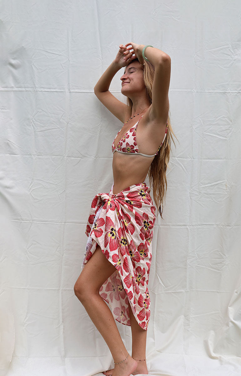 tai swim co coco sarong in haena hau floral pink and light white pink floral hawaiian flower on a beach cover up oversized pareo in silky lyocell fabric with matching bikini flower assortment silky hawaiian beach cover up from kailua oahu