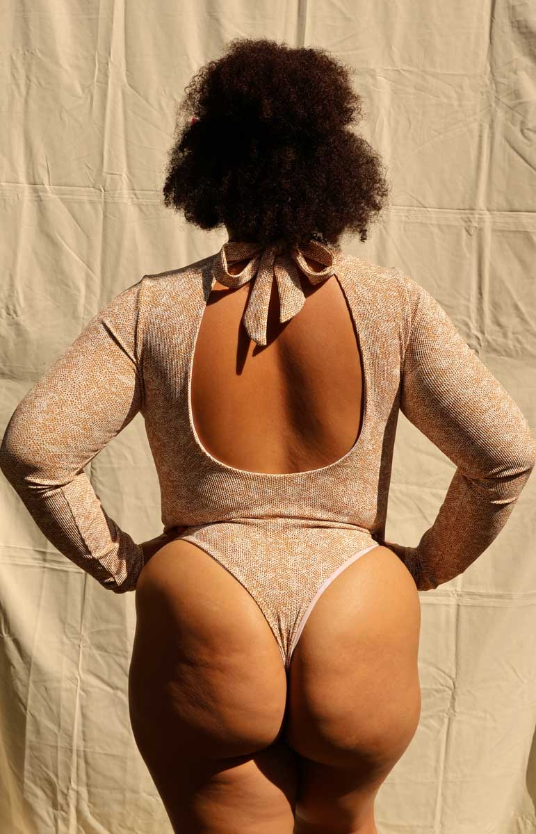 tai swim co hoku long sleeve surf suit from oahu kailua hawaii animal print gold snake print abstract bikini from kailua