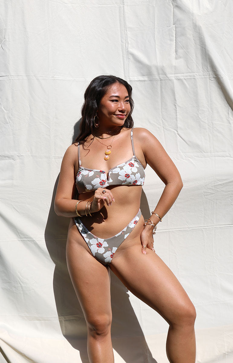 tai swim co mariah thong bottom in kailua white floral hibiscus hawaiian bikini print swimwear pattern from windward side oahu bikini top and bottom in matching high waisted set sustainable cheeky bikinis