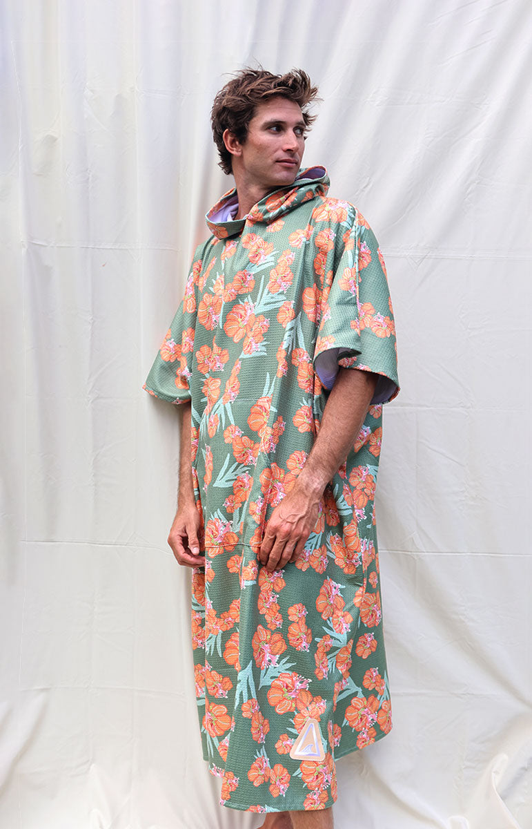 tai swim waikoloa orange and green wiliwili flower changing surf poncho made from recycled waffle terry microfiber hooded towel for tall guys comfy snuggie quick drying towel from oahu hawaii kailua local hawaiian accessories from hawaii
