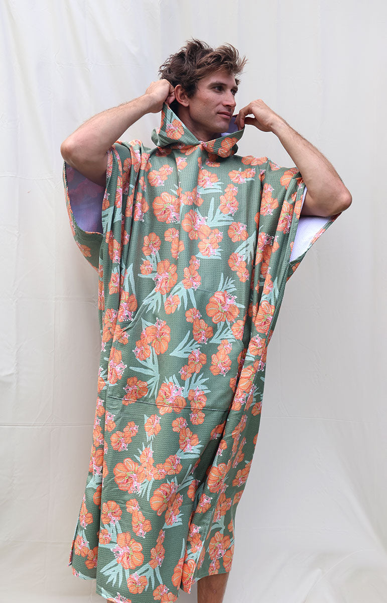 tai swim waikoloa orange and green wiliwili flower changing surf poncho made from recycled waffle terry microfiber hooded towel for tall guys comfy snuggie quick drying towel from oahu hawaii kailua local hawaiian accessories from hawaii one size fits all luxury surf towel