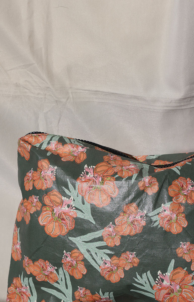 Floral-patterned waikoloa green bag on a white background