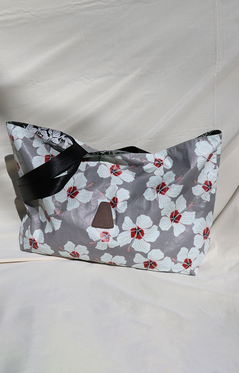 tai swim co kailua hibiscus red from kailua oahu hawaii recycled reversible tyvek bag