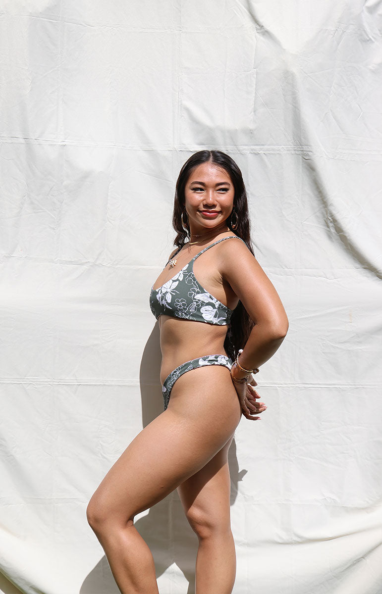 tai swim co sailor top in pua green puakenikeni ginger print on a reversible sustainable bikini from tai swim co