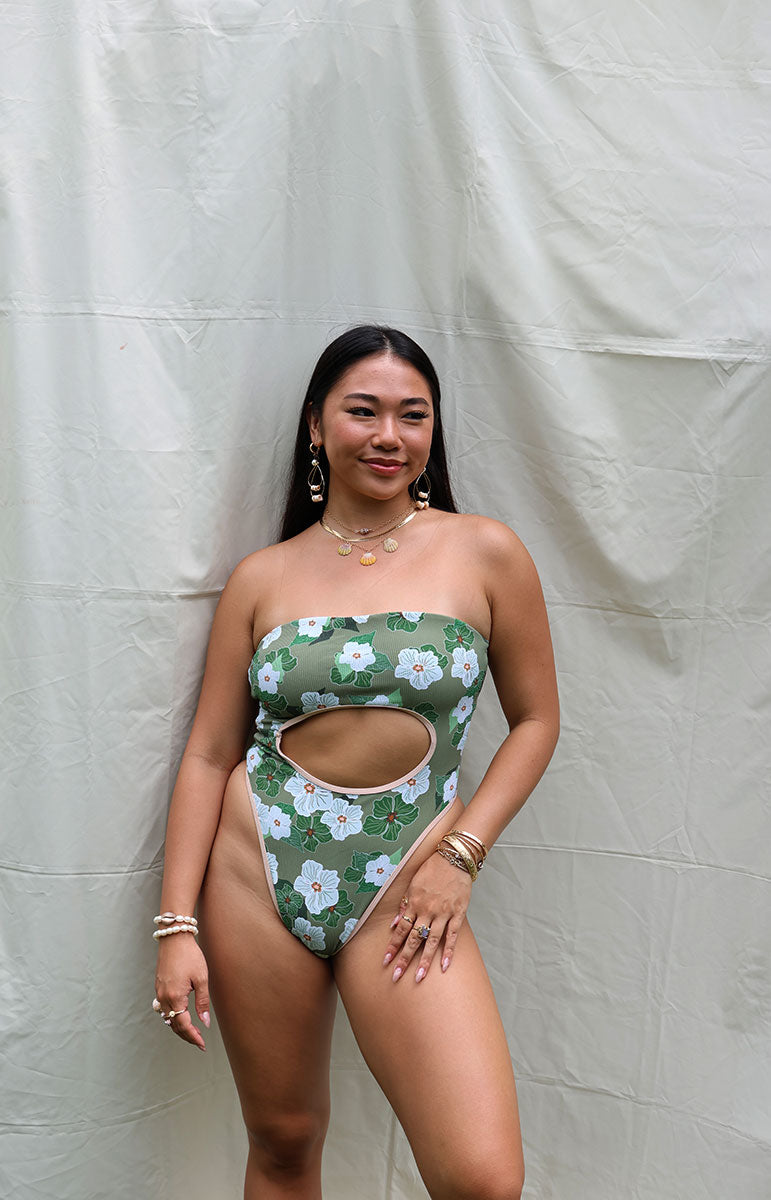 tai swim co sarah one piece from oahu kailua hawaii green and white pikake floral hawaiian swimwear print with retro sporty piping and green leaves with a vintage silhouette and reversible lining