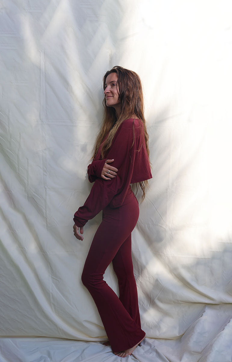 tai swim co cotton lounge shaiann top in rose burgundy maroon long sleeve top and flare pants made of organic cotton eco friendly materials