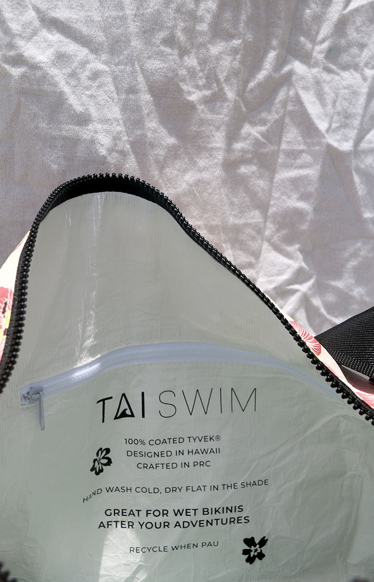 tai swim co recycled tyvek large beach tote with hand drawn floral hau bush flowers in the haena print inspired by kauai north shore florals hawaii sustainable swimwear and splash proof accessories