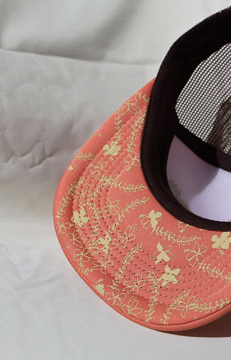 tai swim co logo pink embroidered adjustable foam pink trucker hat in unreleased hana print with hidden hibiscus print detail comfy trucker hat