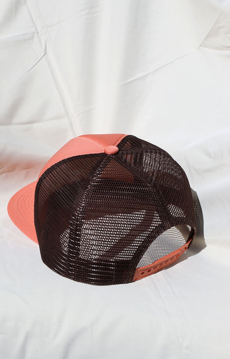 tai swim co logo pink embroidered adjustable foam pink trucker hat in unreleased hana print with hidden hibiscus print detail comfy trucker hat guava pink pastel colored hat