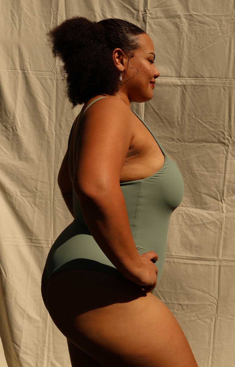 tai swim jordyn one piece in green fern ribbed cheeky sustainable bodysuit comfy material