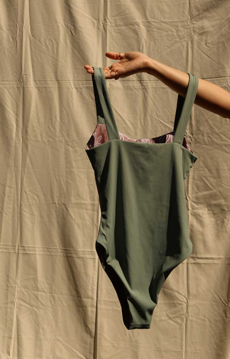 tai swim jordyn one piece in green fern ribbed cheeky sustainable bodysuit comfy material