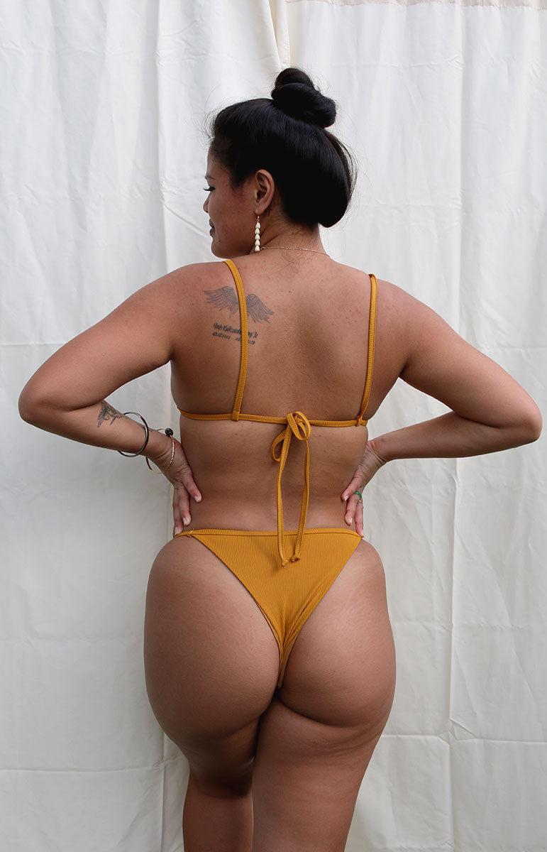 tai swim co eli bottoms in mango ribbed yellow cheeky sustainable thin strap swimwear bottoms from hawaii eco friendly bikinis