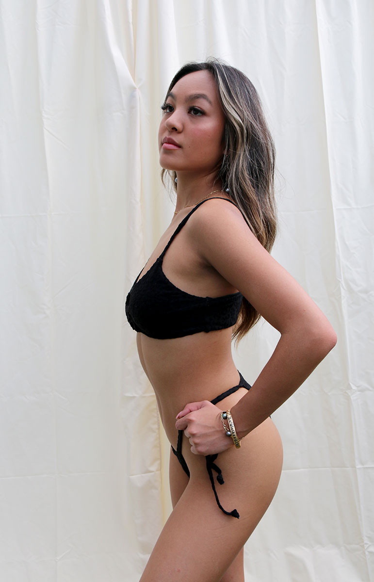 tai swim co textured animal print black hiwahiwa evelyn top in dark black swimsuit strappy style sustainable swimwear hawaii