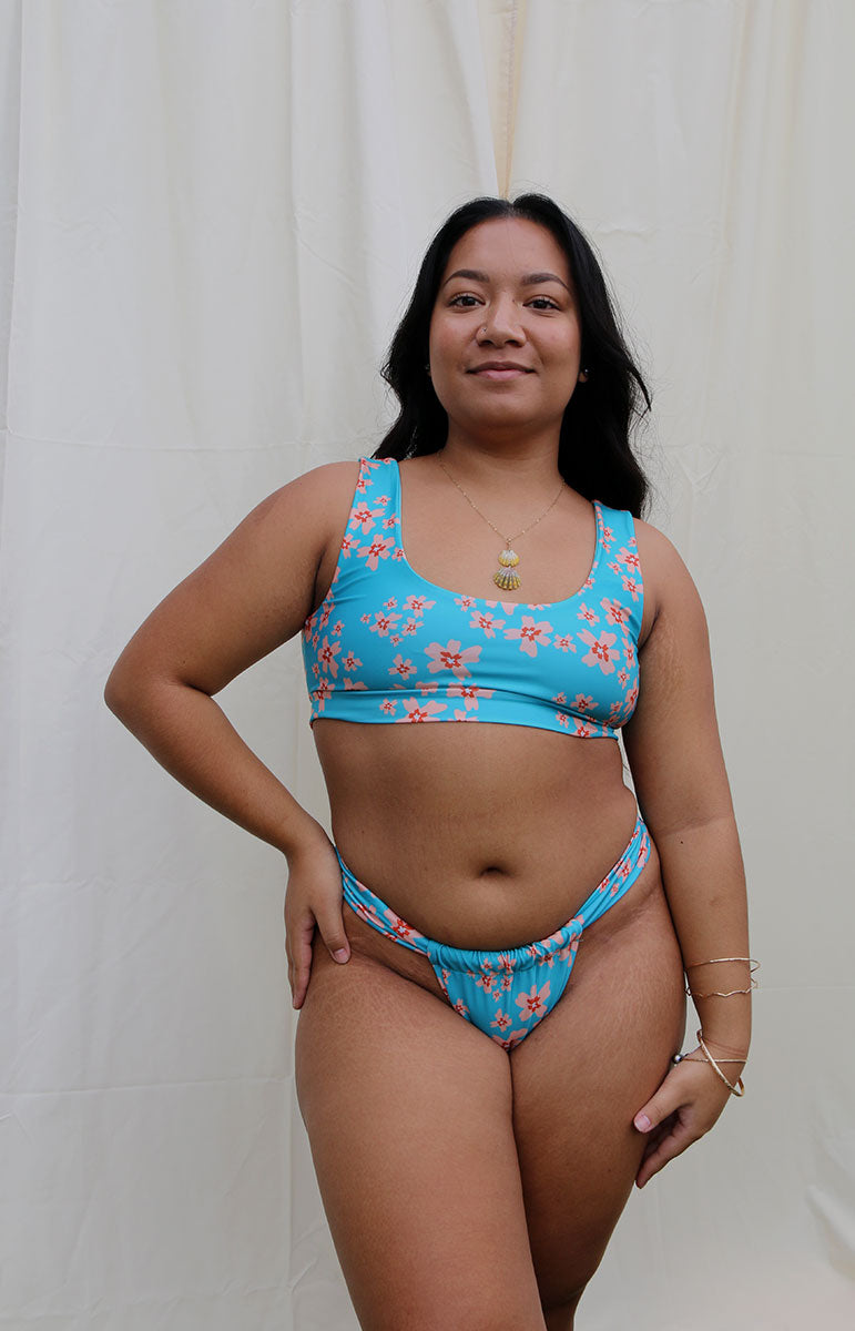 tai swim co starr top in blossom blue floral sporty thick strap tank top open back bikini top sustainable hawaii swimwear