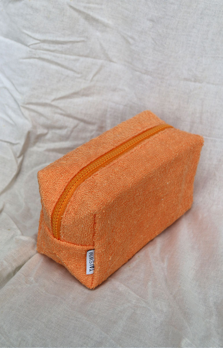 tai swim co zipper terrycloth bag with matching swimwear print on the inside gold zipper cosmetics vacation travel bag orange bright towel material bag