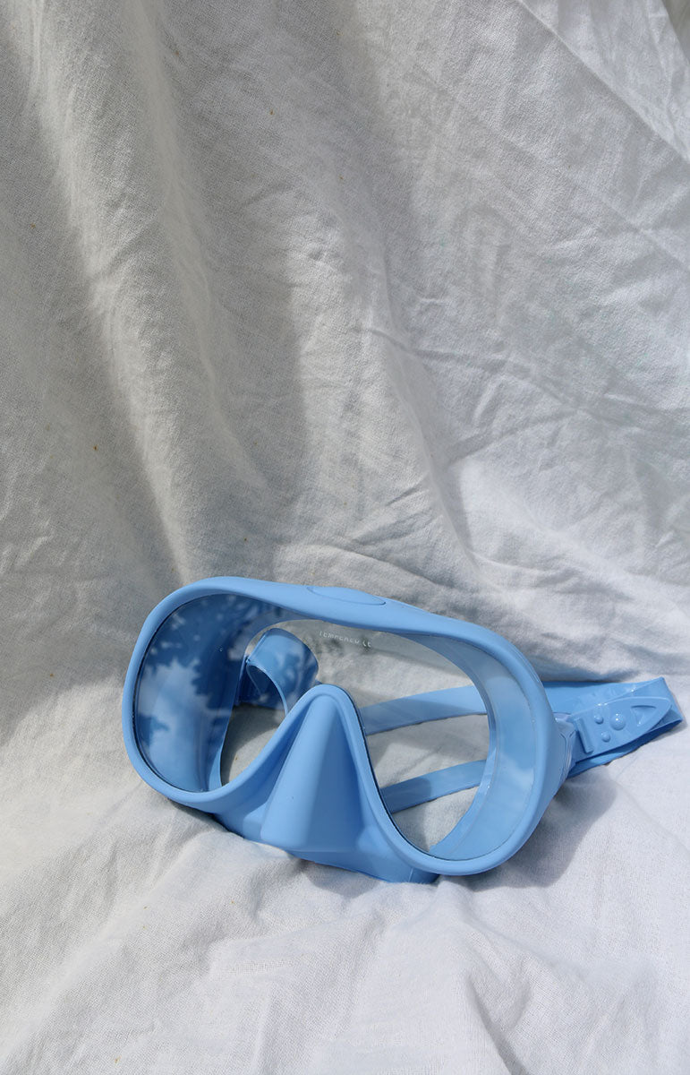 tai swim co diving mask in rain light blue pastel color snorkel and mask mask light shore seafoam green electric pastel diving gear high quality silicone diving mask in multicolor fun fashionable cute frameless sustainable diving gear from oahu kailua hawaii same day shipping accessory local diving mask rental hawaii oahu