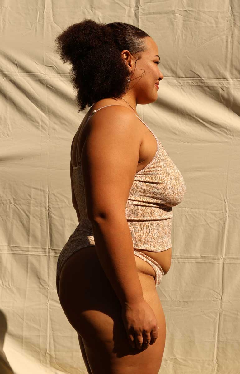 tai swim chelsea tank top in tako gold abstract animal print bikini tops and bottoms