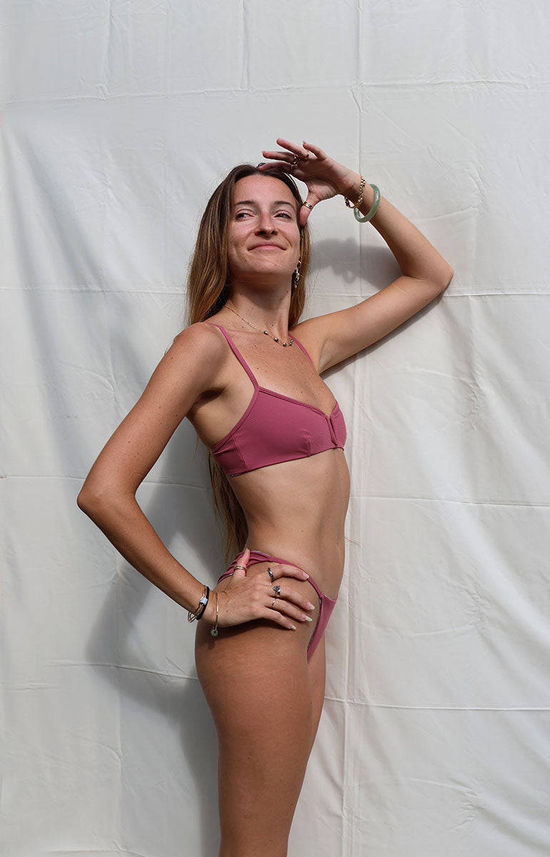 tai swim co v cut haley top with metal v shape bikini swimwear top in color hibiscus thin ribbed swimwear top and bottom material from sustainable repreve fabric oahu hawaii