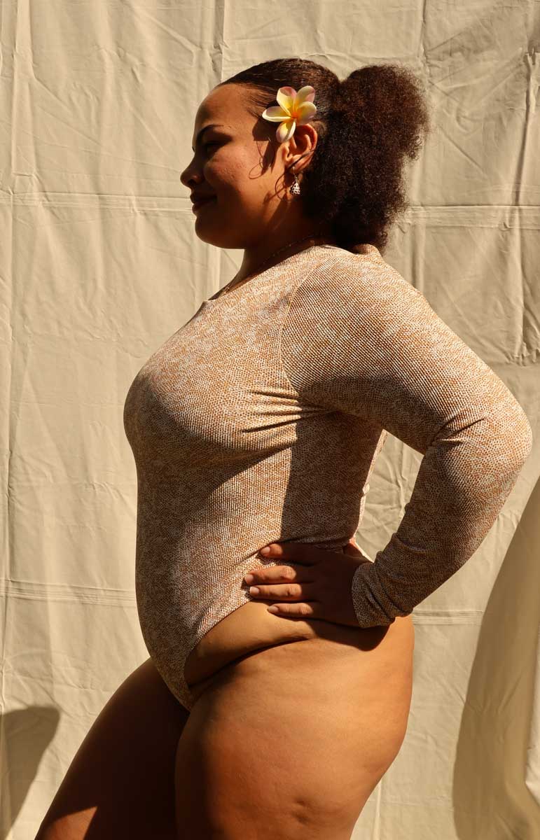 tai swim co hoku long sleeve surf suit from oahu kailua hawaii animal print gold snake print abstract bikini from kailua