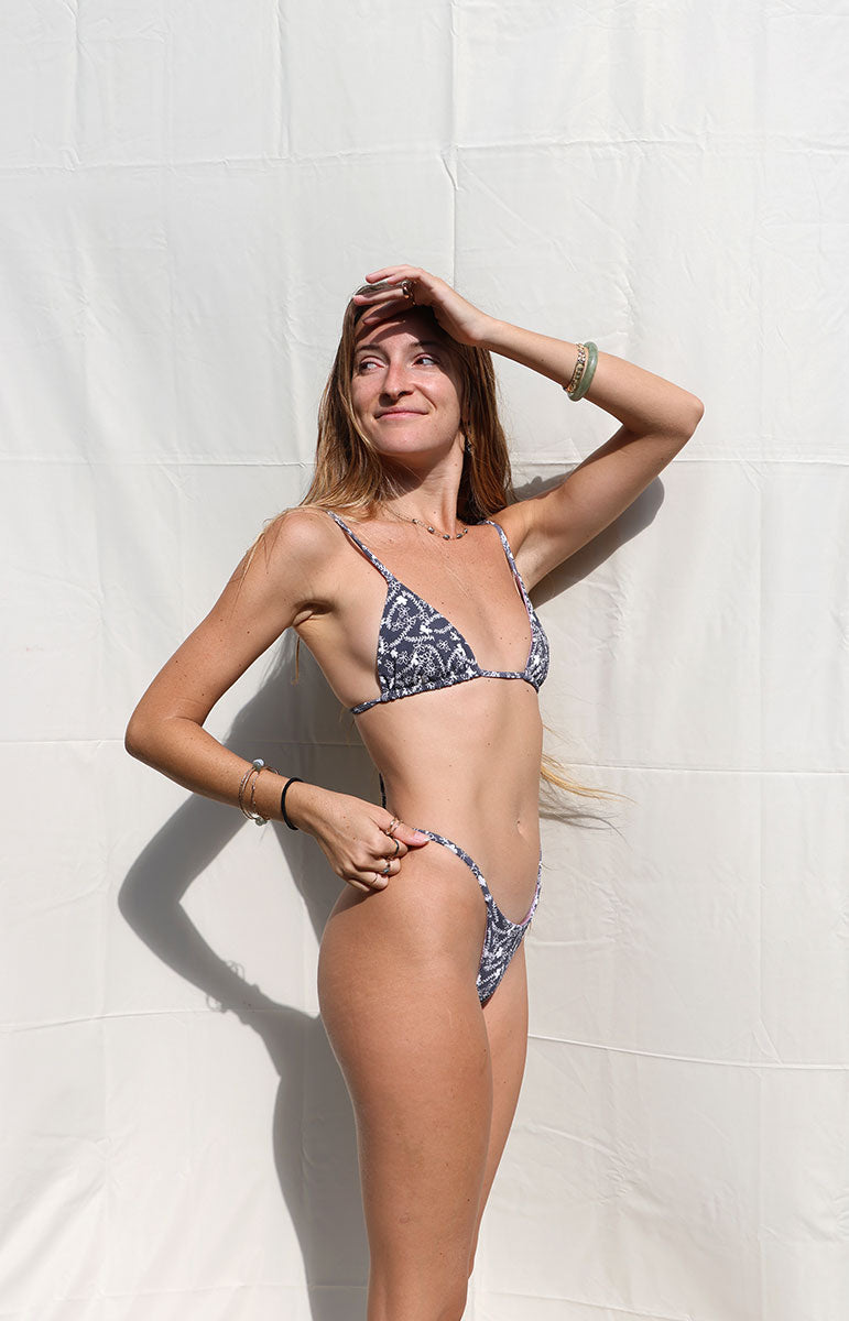 tai swim co joelle triangle top in kuro black hibiscus floral dainty vintage aloha skimpy swimwear triangle top with thin strap bottom from kailua oahu hawaii comfy double lined swimwear tops and bottoms