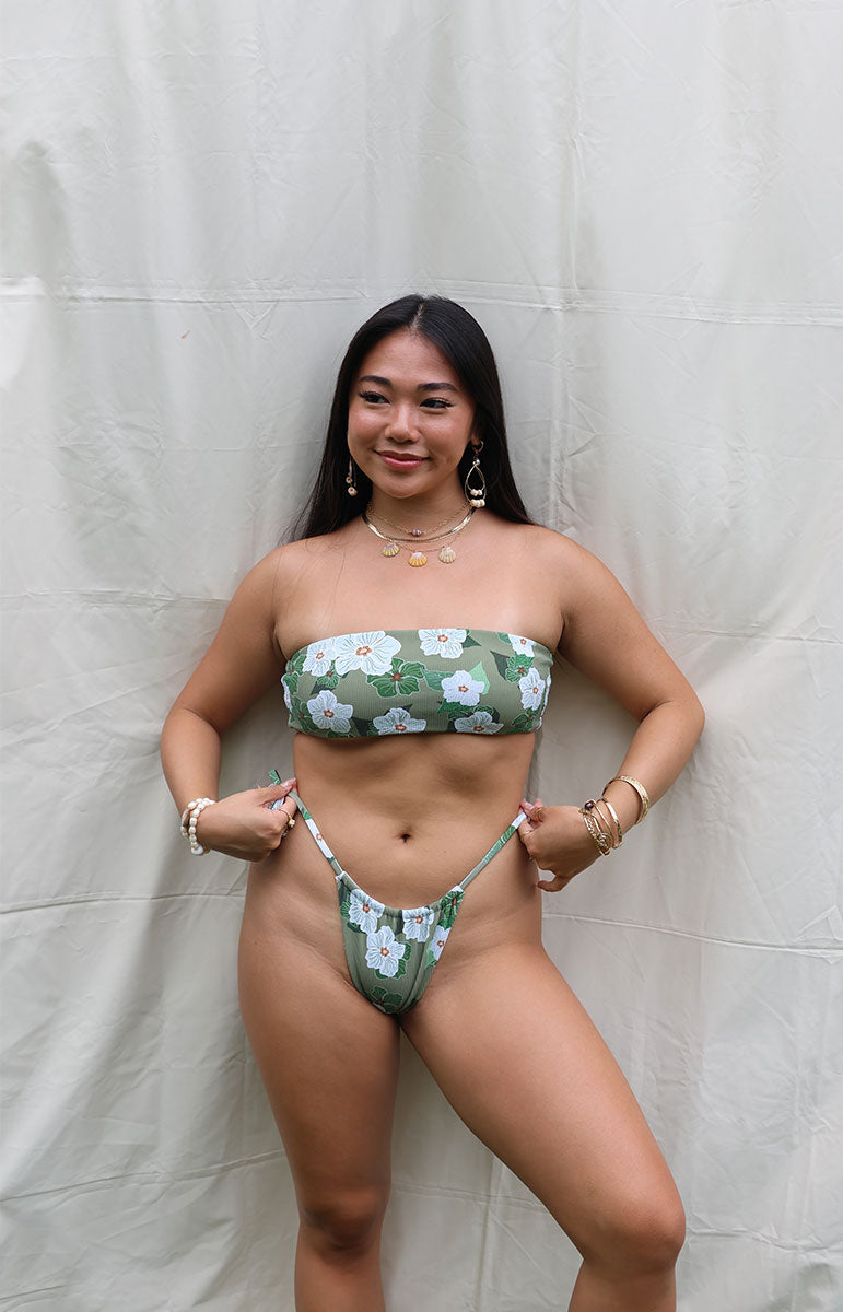 tai swim co adjustable cheeky side tie maddie bottom in pikake green hawaiian flower lace up tie back bikini top and bottom with side ties and local drawn hawaii flowers from kailua oahu