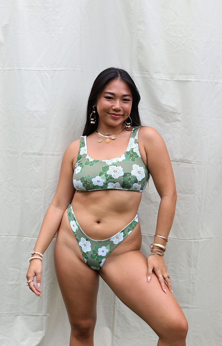 tai swim co mariah cheeky thong bottom from kailua oahu hawaii designer swimwear made in small batches from green white flowers eco friendly high rise bikini bottoms scoop neck bikini bottom