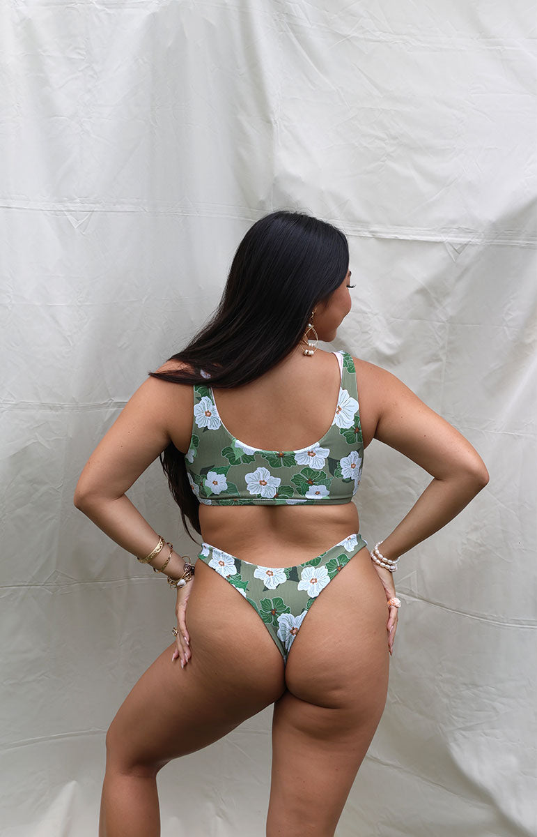 tai swim co mariah cheeky thong bottom from kailua oahu hawaii designer swimwear made in small batches from green white flowers eco friendly high rise bikini bottoms