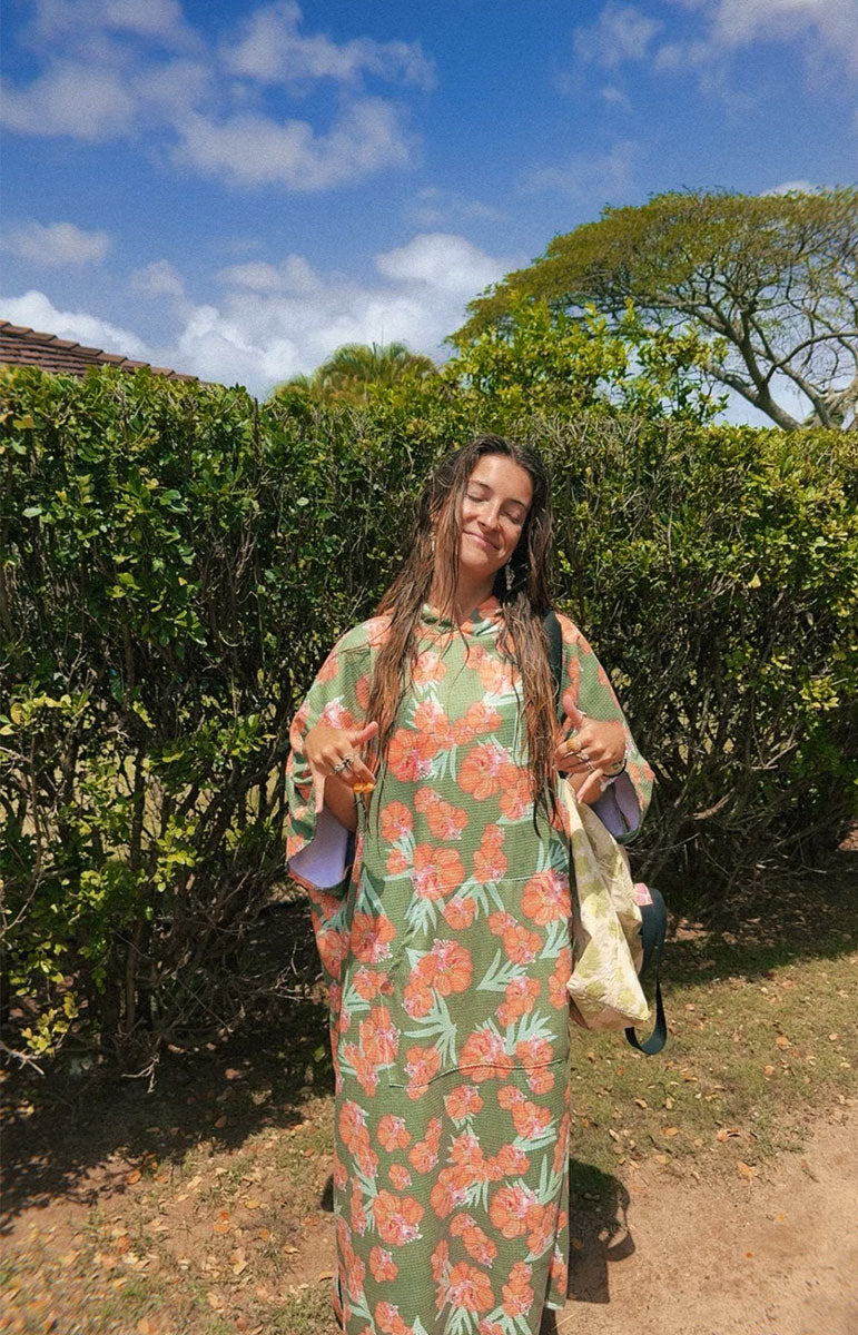tai swim waikoloa orange and green wiliwili flower changing surf poncho made from recycled waffle terry microfiber hooded towel for tall guys comfy snuggie quick drying towel from oahu hawaii kailua local hawaiian accessories from hawaii on tai swim co unisex clothing design