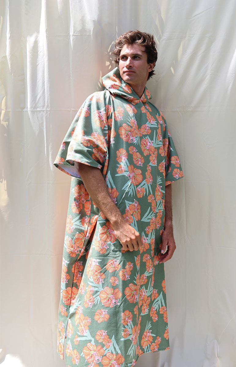 tai swim waikoloa orange and green wiliwili flower changing surf poncho made from recycled waffle terry microfiber hooded towel for tall guys comfy snuggie quick drying towel from oahu hawaii kailua local hawaiian accessories from hawaii surfing accessories towels