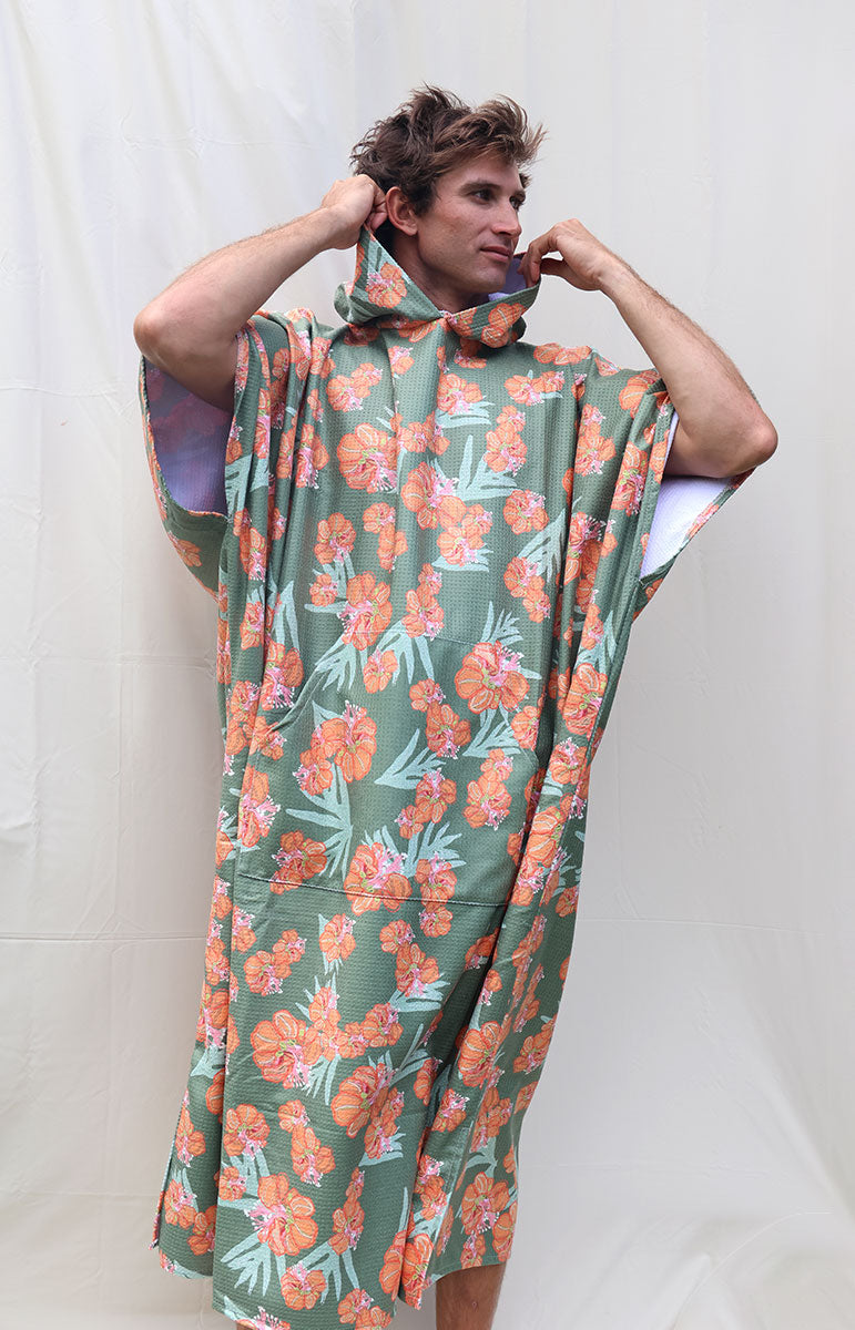 tai swim waikoloa orange and green wiliwili flower changing surf poncho made from recycled waffle terry microfiber hooded towel for tall guys comfy snuggie quick drying towel from oahu hawaii kailua local hawaiian accessories from hawaii one size fits all luxury surf towel