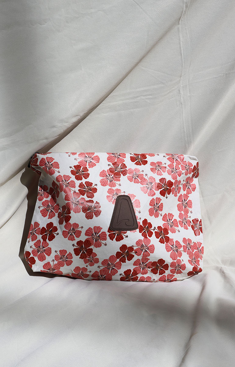 tai swim Haleiwa Floral-patterned pouch on a light fabric background