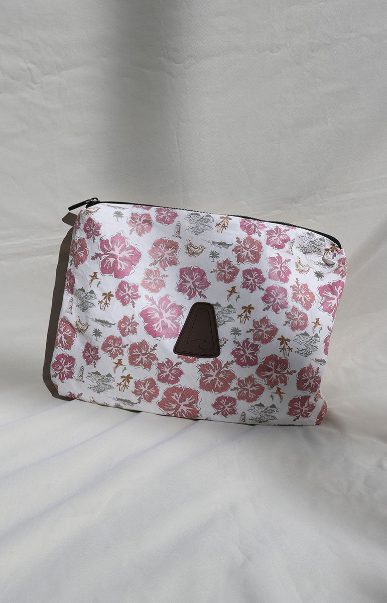 Tai Swim Kaohao Floral patterned pouch with a brown zipper on a white background