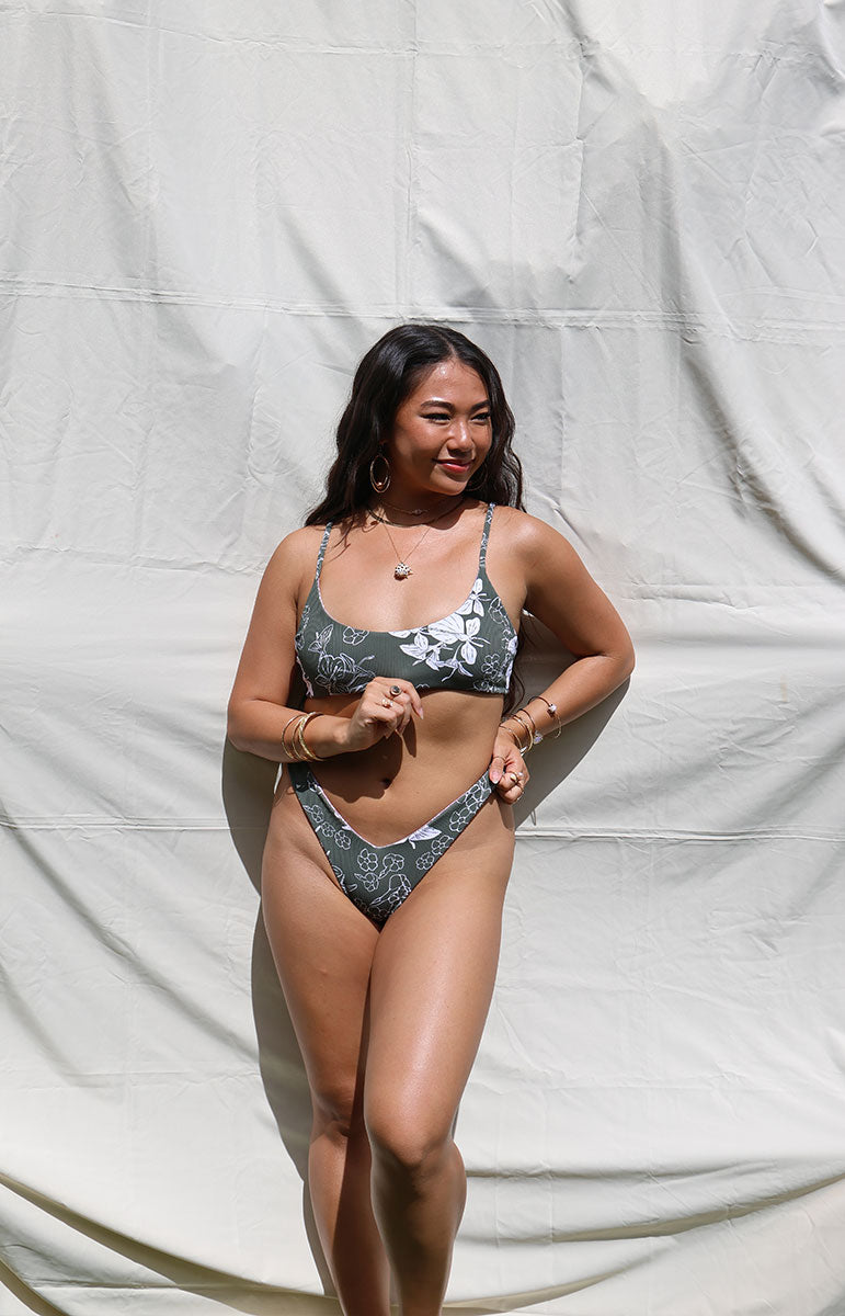 tai swim co sailor top in pua green puakenikeni ginger print on a reversible sustainable bikini from tai swim co