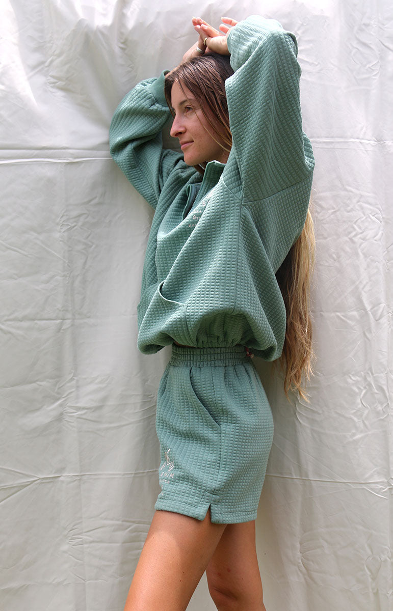 tai swim co fern green recycled comfortable waffle textured high waisted sweat shorts from hawaii in kailua on oahu cheeky adjustable winter matching sweat set quarter zip athleisure set sustainable matching green coastal hamptons girl hawaiian owned and designed businesses