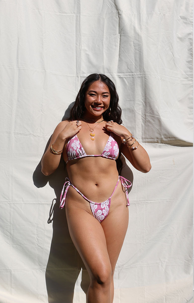 tai swim co tai bottom in hana stringy sliding side tie bottom with minimal coverage skimpy side tie bottom from kailua oahu hawaii pink woodblock print inspired textured bikini thong brazilian style bottom from windward side oahu