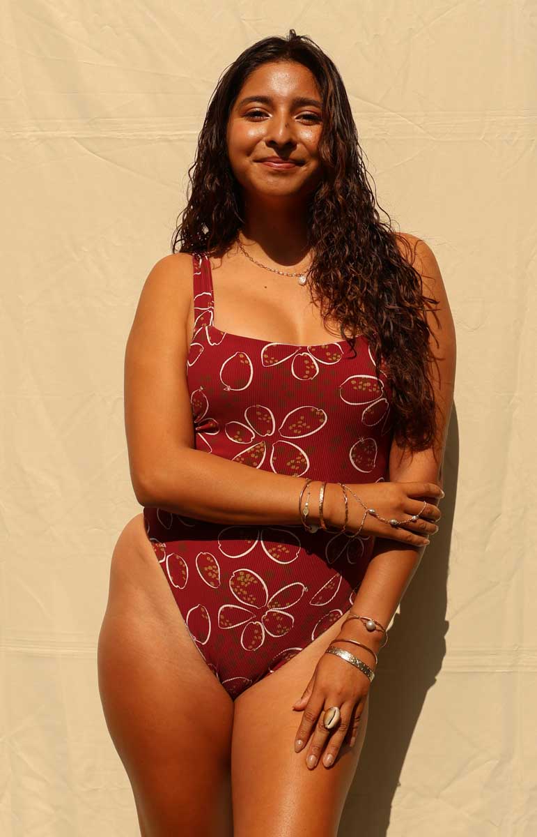 tai swim cowry jordyn one piece cowrie shell supportive one piece in maroon magenta shell shaped pattern on swimwear from hawaii