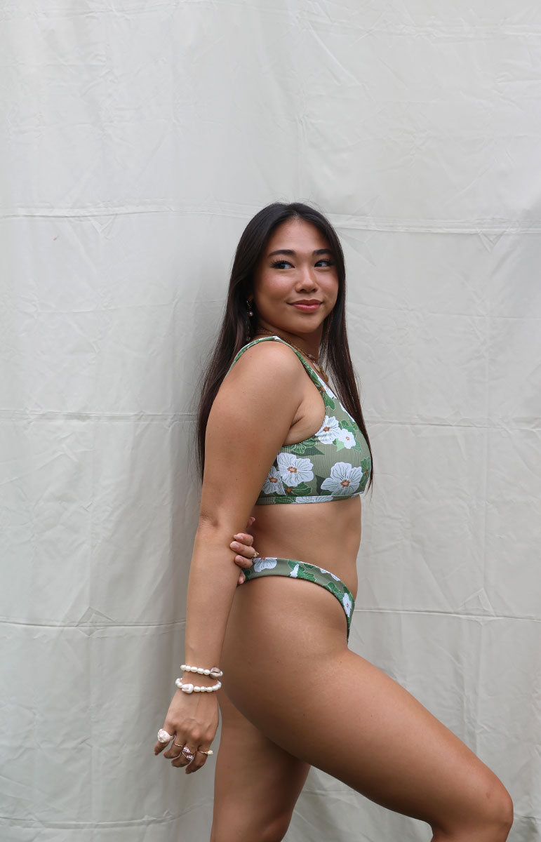 tai swim co mariah top sporty thick strap scoop neck bikini top with sporty straps and thong bottom in pikake flower green gardenia petals and hand drawn flowers