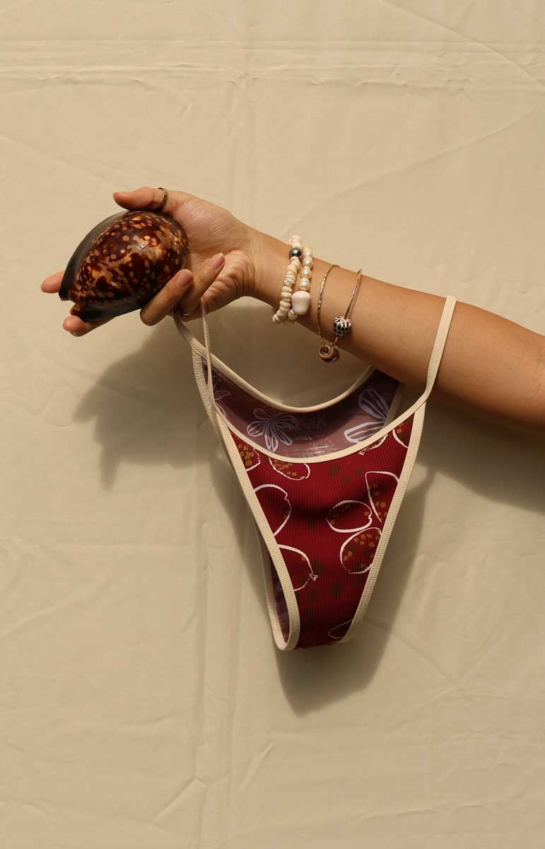 tai swim mina bottom in cowry red maroon print with shell outlines