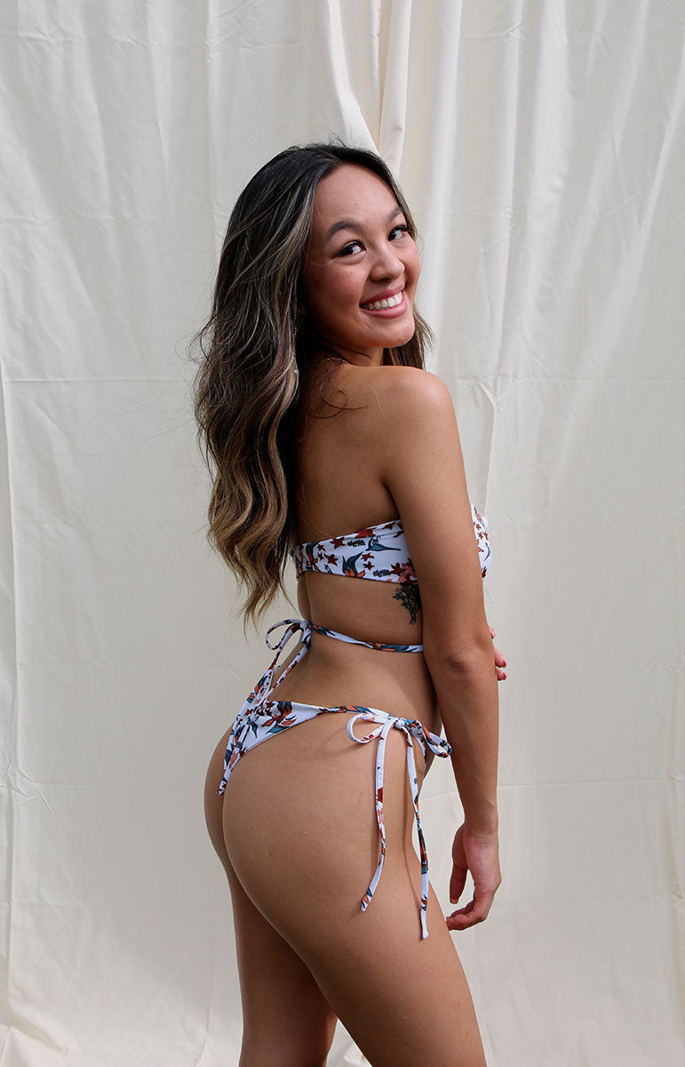 tai swim co page bottom in leahi sustainable cheeky thong ruched tropical print swimsuits hand drawn eco friendly sustainable swimwear